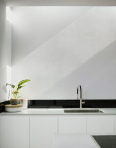 Maike Design white kitchen with skylight