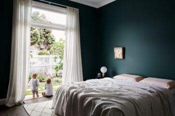 Maike Design single family home multi generational living. Linen sheets and artwork.