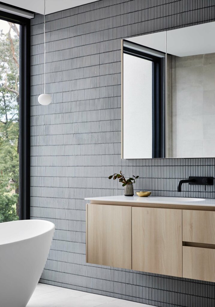 Maike Design bathroom. Mosaic tile, timber vanity and freestanding bath